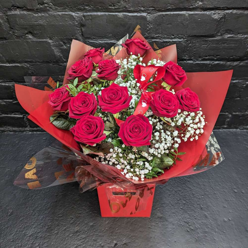 Arrangement dans une boîte de Roses rouges